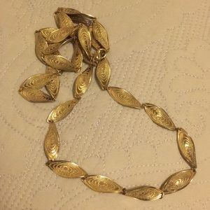 Long gold necklace
